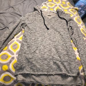 Tilly’s grey sweatshirt